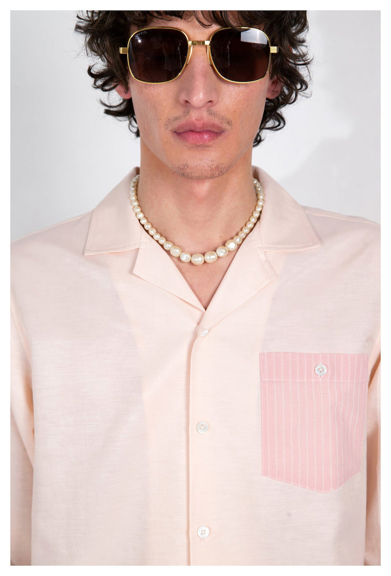 pink shirt with contrast pocket